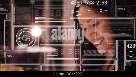 Smiling Chinese woman leaning toward floating data panels with light flare at tech hub, copy space Stock Photo