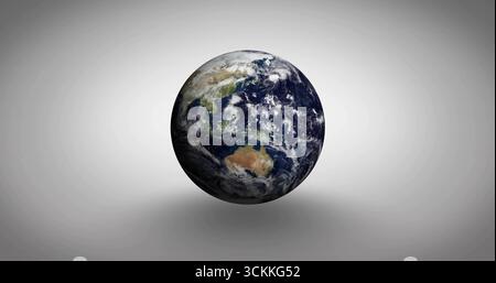 Floating 3D rendered planet Earth rotating in studio environment, with clouds and ocean textures Stock Photo