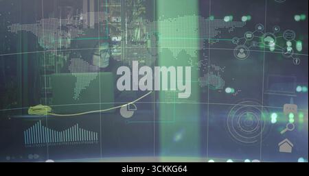 Analyzing network data while Korean analyst typing on laptop amid server racks with green overlays Stock Photo
