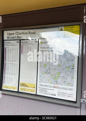 Manchester, UK - September 11, 2025: The displayed bus schedules and route map offer transit information for commuters in Manchester. Upper Chorlton R Stock Photo