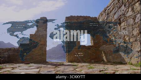 Displaying central ruin arches framing calm sea view on platform, with network overlay data points Stock Photo