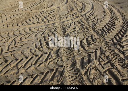 View from above on deep tire tracks in the sand Stock Photo
