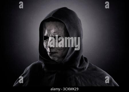 Portrait of a scary figure in hooded cloak Stock Photo - Alamy