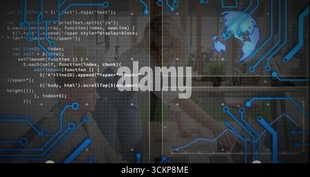Coding developers using laptop and smartphone in living room, showing circuit graphics, copy space Stock Photo