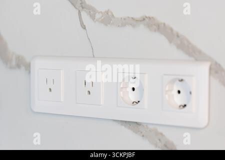 Universal power outlets. Modern interior. Marble wall design. Stock Photo