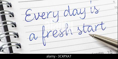 Every day is a fresh start written on a calendar page Stock Photo
