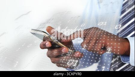 Holding and tapping male hands in business attire in office, with gold smartphone, binary overlay Stock Photo