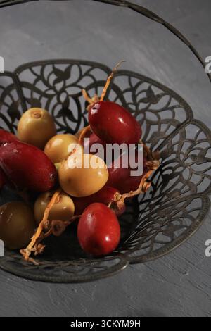 Yellow and Red Fresh Raw Dates Stock Photo
