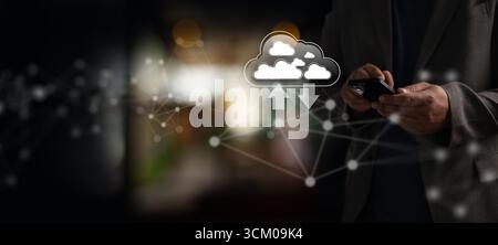 Cloud computing and data synchronization concept with secure online storage and mobility, shown by businessman using smartphone with network nodes and Stock Photo