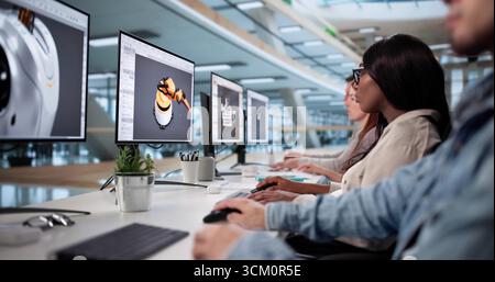 Diverse Team Of Designers Developing 3D CAD Models Online Stock Photo