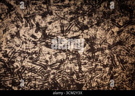 Abstract black scuff marks on a white surface. Stock Photo