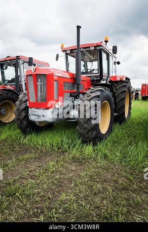 A red Schlüter tractor at a historic agricultural tractor show, Hallbergmoos, Bavaria, Germany Stock Photo