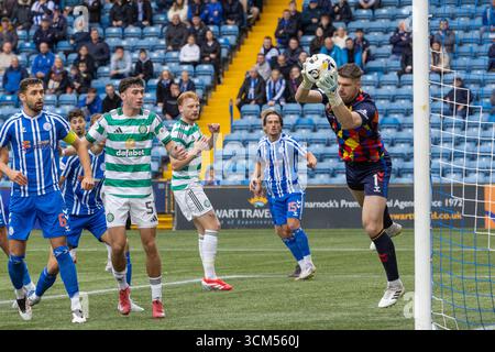 Kilmarnock, UK. 14 September 2025. Kilmarnock, UK. Kilmarnock FC played Celtic FC at Rugby Park, Kilmarnock, Ayrshire,  Scotland in a William Hill Premiership game. The final score was Kilmarnock 1 -2 Celtic. Max Stryjek, Kilmarnock goalkeeper saves an attempt by Celtic to score. Credit: Findlay/ Alamy Live News Stock Photo