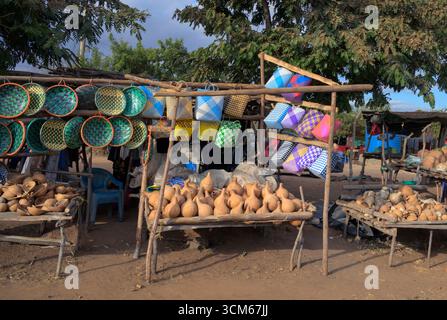 Rural roadside market for calabash bowls, other wooden items, baskets and bags in Taita-Taveta County, Kenya. Stock Photo