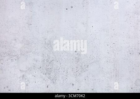 simple light gray cement wall. highly detailed textured background. Stock Photo