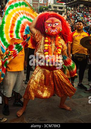 Vibrant Indra Jatra festival. A masked dancer embodies the Majipa Lakhey, a revered protector deity from Nepali folklore. Stock Photo