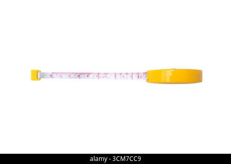 Flexible measuring tape isolated on white background with yellow plastic case, extended white tape showing red centimeter markings, tool for sewing, t Stock Photo