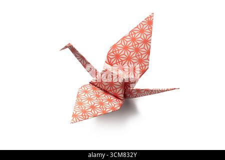 Origami paper crane isolated on white background Stock Photo