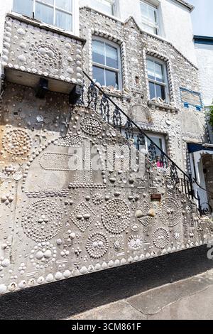 Polperro’s Shell House became a listed building in 1986 in recognition of its unique design and its importance to the community and it remains to this Stock Photo