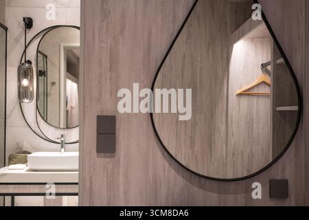 Wardrobe and restroom inside a modern luxury hotel. Stock Photo