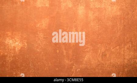 Rough full frame  textured stucco in bright terracotta color. High resolution texture of plaster for 3d models, background, pattern, poster, collage, Stock Photo