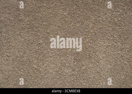 Rough full frame  textured stucco in bright terracotta color. High resolution texture of plaster for 3d models, background, pattern, poster, collage, Stock Photo
