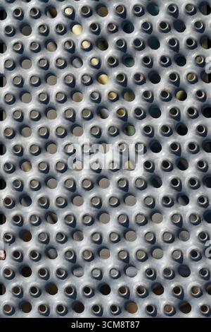 Perforated sheet, background image Stock Photo