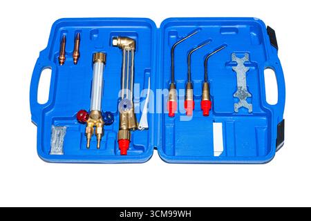 Welding brazing and cutting torch kit. A new set of welding torches for soldering and cutting metal, on a white background in the box. Stock Photo