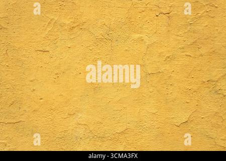Yellow grunge wall. High resolution vintage background. Stock Photo