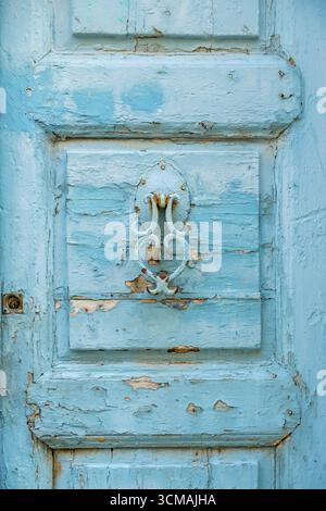 Old turquoise door knocker in the old town of Rethymno, Europe, Crete, Greece, Rethymno, GR, Travel, Tourism, Destination, Sightseeing Stock Photo