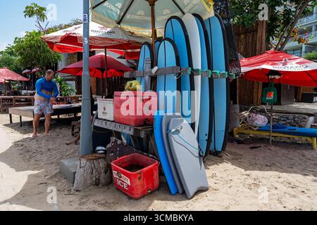 Kuta, Bali, Indonesia - Sept 02, 2025: Surfboard rental stall in Legian beach Bali Stock Photo