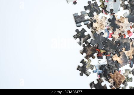 Puzzles on a white background, space for text. Stock Photo