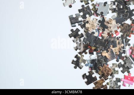 Puzzles on a white background, space for text. Stock Photo