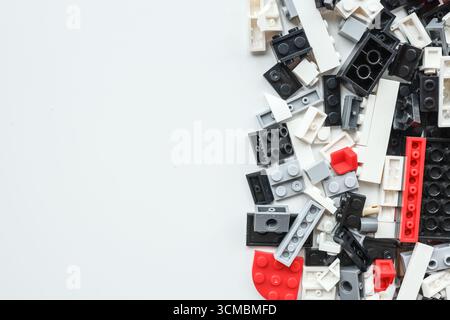 Wall from Plastic building blocks isolated on white background. Top view with copy space Stock Photo
