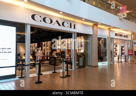 Sepang, Selangor, Malaysia - Sept 06, 2025: Coach store at Mitsui Outlet Park KLIA Sepang. Coach is an American luxury brand specializing in handbags, Stock Photo