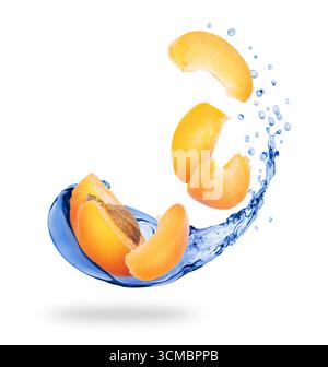 Slices of apricots with splashes of fresh water close-up on white background Stock Photo