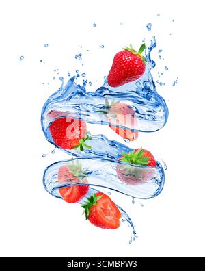 Strawberries with splashes of water in a swirling shape on white background Stock Photo