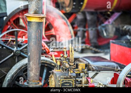 Detailed view of historic steam engine pipes, valves, and brass regulator at Coolgreany Vintage Parade, Wexford. Stock Photo