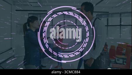Shaking hands colleagues in business attire exchanging greetings in conference room with AR overlay Stock Photo