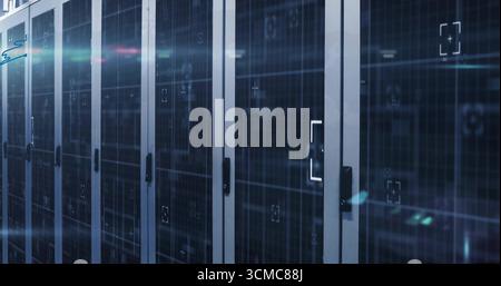 Displaying server cabinets receding through data center corridor, with blinking LED scan overlay Stock Photo