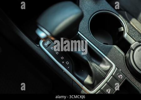 Selector automatic transmission with leather in the interior of a modern expensive car. Stock Photo