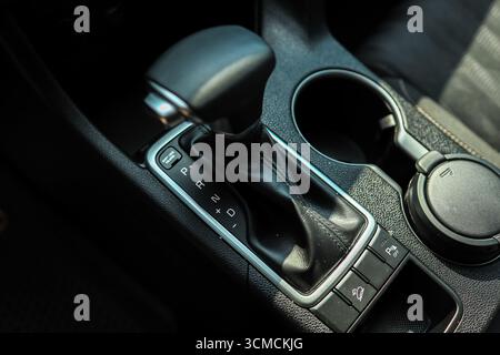 Selector automatic transmission with leather in the interior of a modern expensive car. Stock Photo