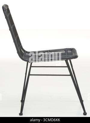 Plastic covered steel frame chair, side view isolated nature background with clipping path Stock Photo