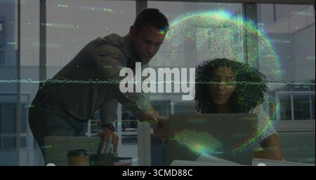 Collaborating professionals analyzing data overlays on office laptop with coffee cup, pencil holder Stock Photo