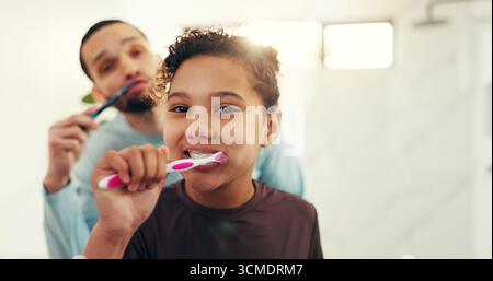 Child, father and brushing teeth with portrait in bathroom for fresh breath, oral hygiene and bonding. Family, girl and man for dental health Stock Photo