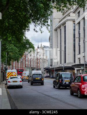 London - 06 24 2022: View of Kensington High Street and Marks & Spencer department store Stock Photo