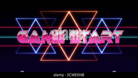Displaying stylized GAME START text on dark arcade-style display, with neon triangles and lines Stock Photo