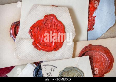 Collection of medieval antique wax seal stamps on old documents Stock Photo