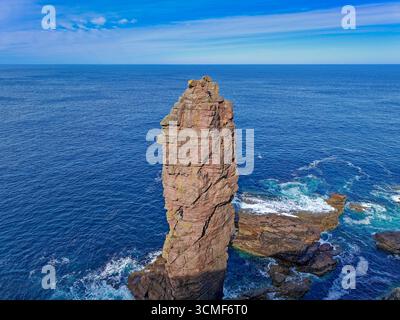 Old Man of Stoer Sutherland Scotland 200 ft sandstone sea stack climbers nearing the summit Stock Photo