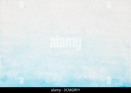 Delicate blue watercolor gradient fading from white creates a soft and subtle background Stock Photo